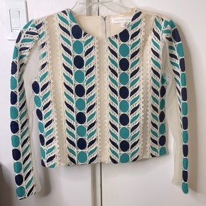 Stylish beautiful cream, blue and green blouse.